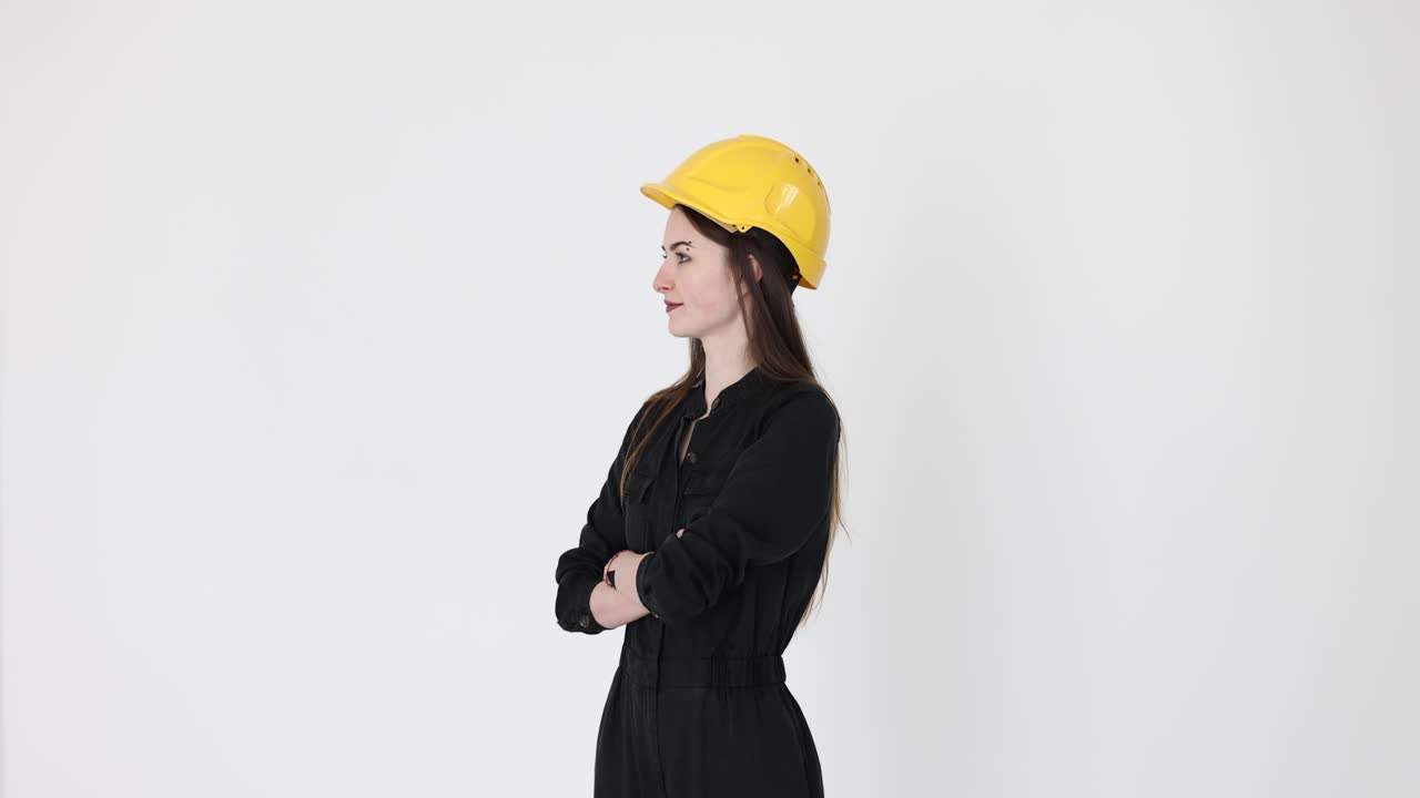 Woman in hard hat and jumpsuit