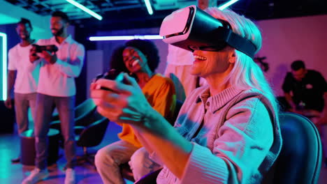 people enjoying virtual reality gaming in a neon-lit environment