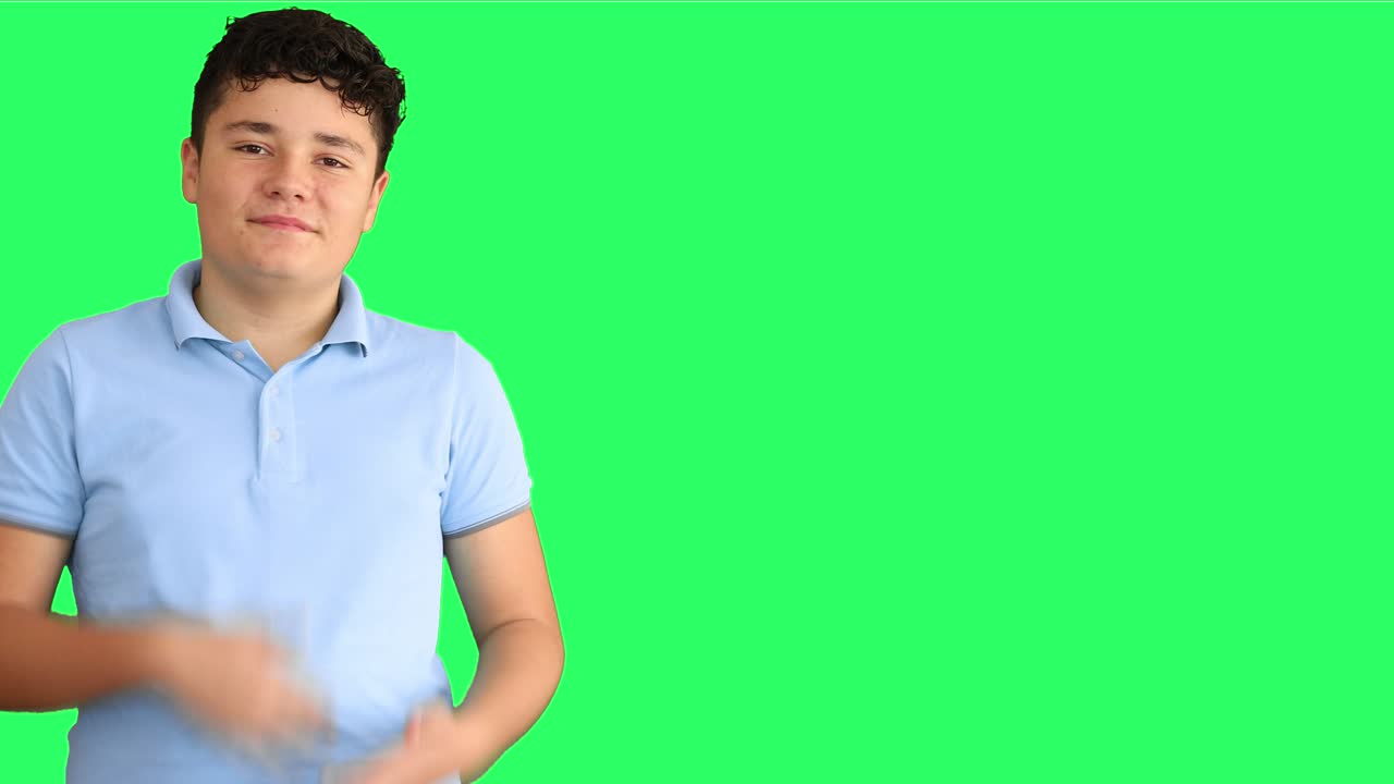 A deaf teenage boy shows the sign language