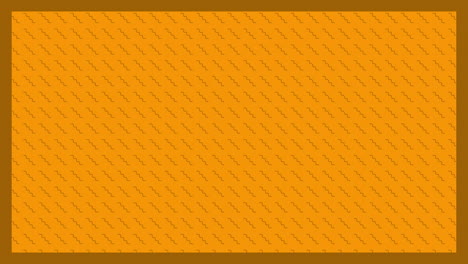 animation of brown zig zag shapes in diagonal lines on orange background