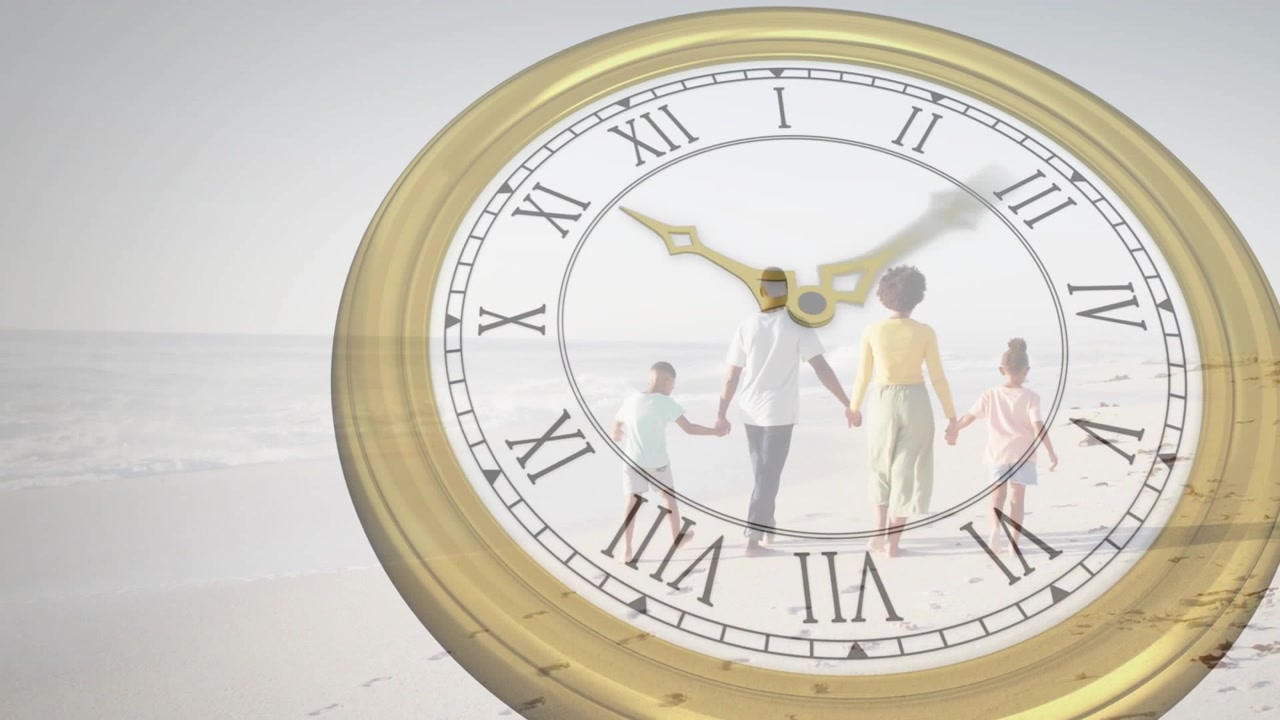 Family walking toward surf starting animated watch hands sweeping across gold dial technology demo