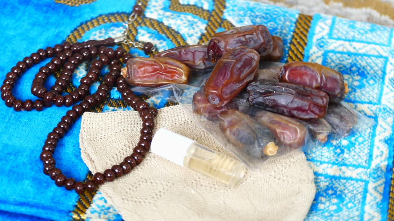 While muslims come from Hajj, they bring dates, prayer rugs and rosaries as a gift.