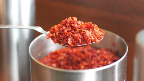 Red Pepper Flakes on a Spoon