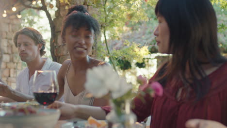 best friends celebrating at dinner party two women drinking wine making toast enjoying summer reunion gathering sitting at table outdoors at sunset 4k