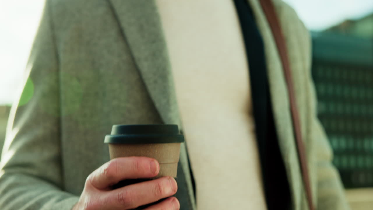 Person Holding Coffee Cup