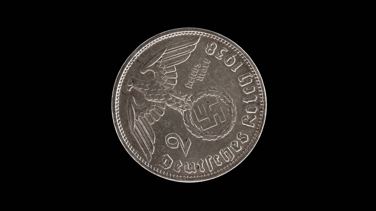 Germany 1938 5 reichsmark coin obverse with imperial eagle and swastika symbol rotating on black background