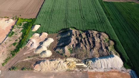 AERIAL---Warehouse-construction-site-foundation,-Austria,-wide-shot-forward