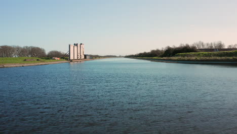 Aerial:-The-locks-of-the-Canal-through-Walcheren,-near-the-historical-town-Veere