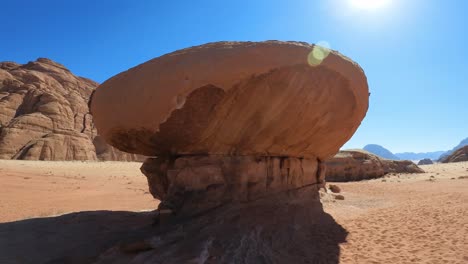 touring mushroom rock in wadi rum