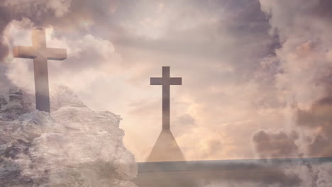 animation of christian crosses over landscape with clouds background