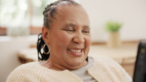 senior black woman with phone