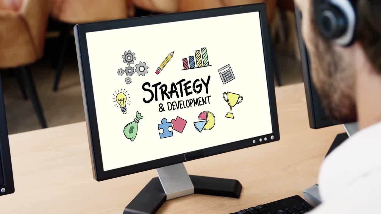 Executive looking strategy and development presentation on computer