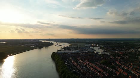 aerial sunset view over beneden merwede in sliedrecht