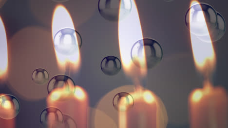 animación de velas encendidas con puntos de luz parpadeantes