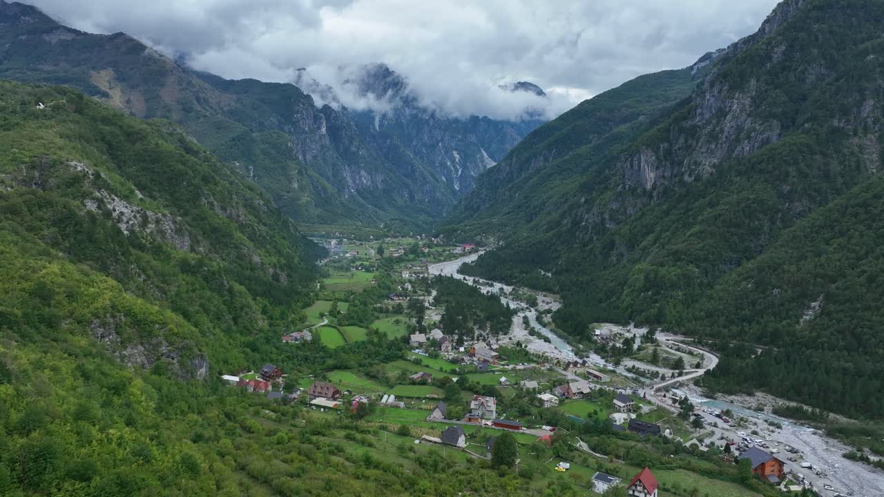 Rural Mountain Village Theth in Albanian National Park Aerial Dolly In
