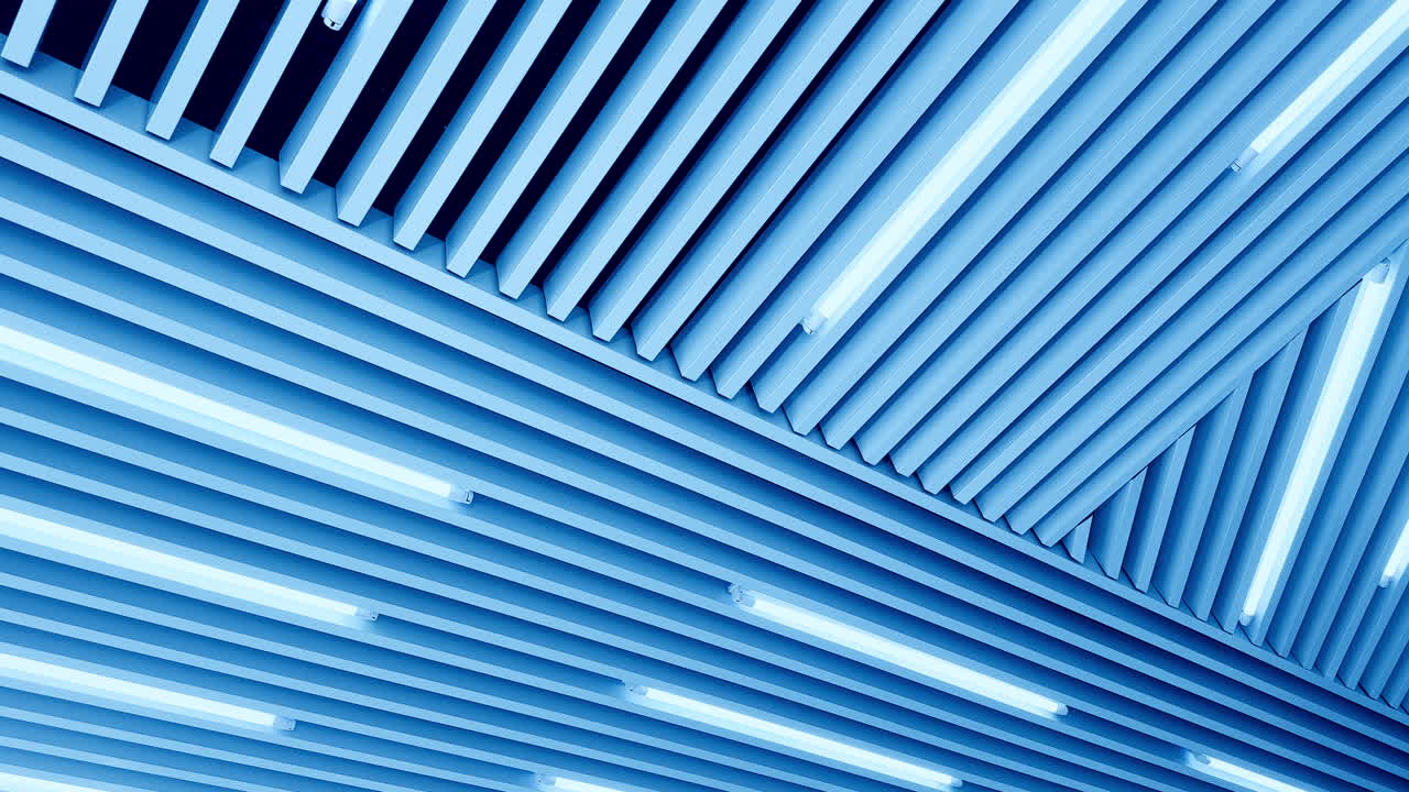 Bright illumination on the embossed plank ceiling. White light led lamps switched on. Low angle view.