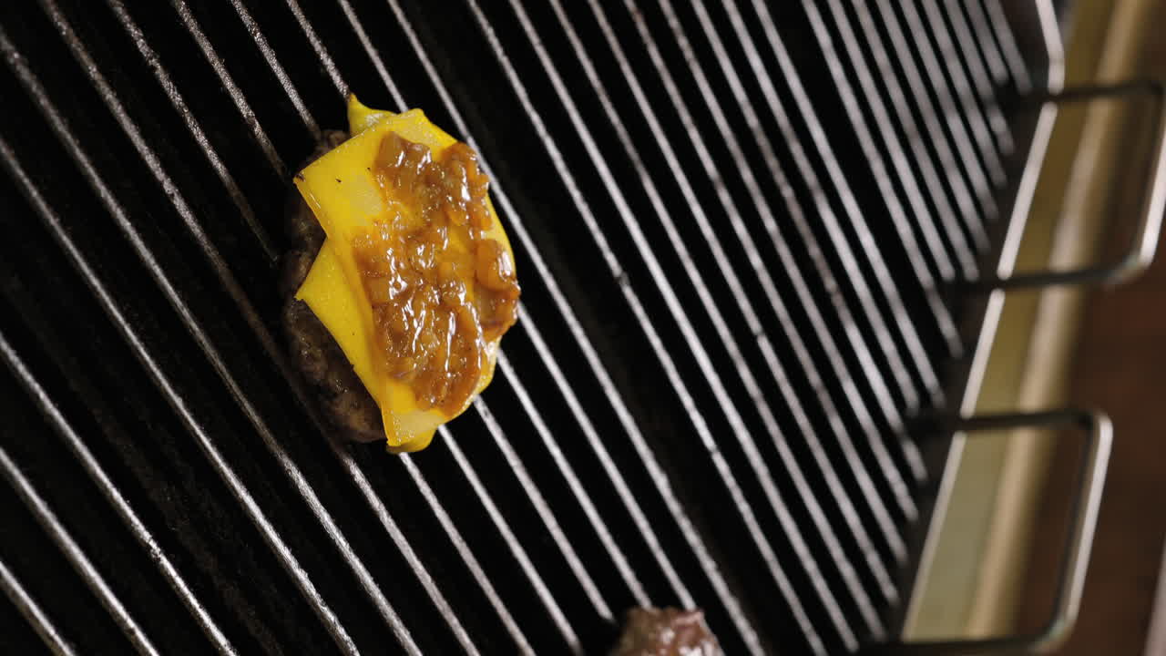 Cheeseburger Perfection: Melting Cheese on a Juicy Patty cooking