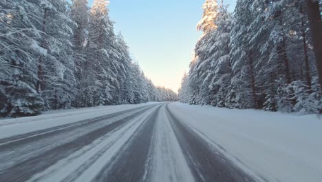 pov tense winter driving commute on ice and snow highway finland climate