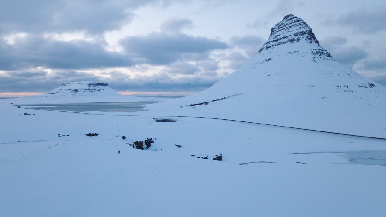 Frozen Kirkjufellsfossar, dramatic blue hour, Iceland
