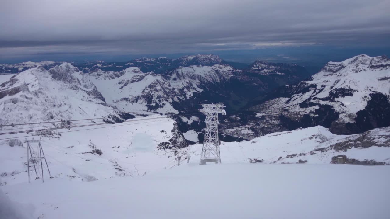 Slow Panning Shot of Stunning Swiss Alps on a cloudy day