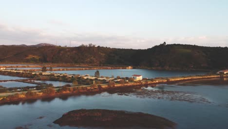 Fishing-farm-in-Milfontes-Portugal-Orbiting-aerial-sunset