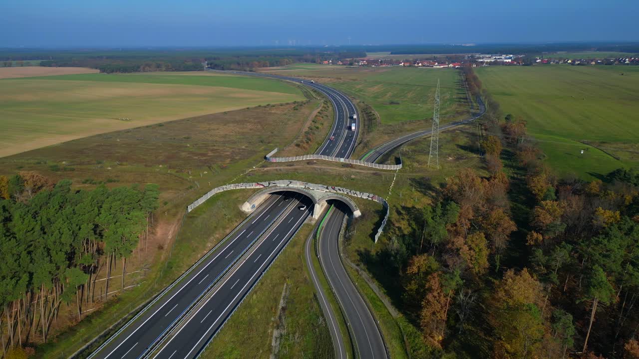 Wildlife crossings Ecoduct, ecopassage, nature ecopassage or green bridge, game changeover. highway in Germany Infrastructure for animals. Nice aerial view flight panorama orbit drone