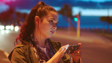 Serious-young-woman-using-her-phone