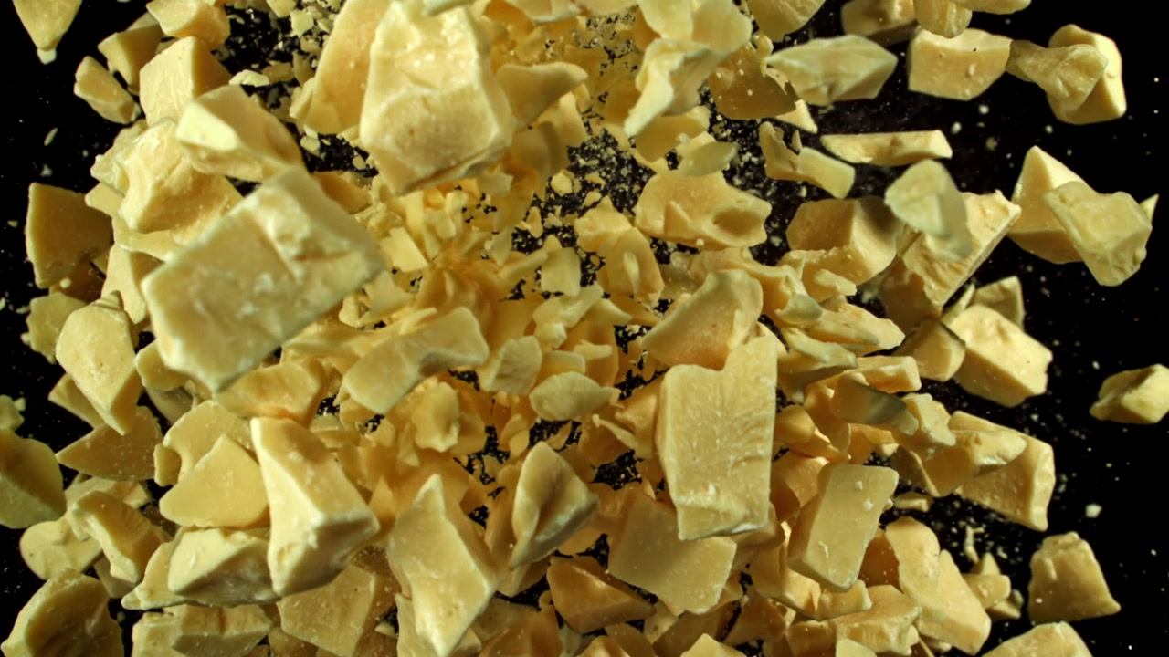 White Chocolate Chunks Exploding and Scattering in Slow Motion