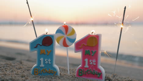 Twins-birthday-candles-and-sparklers-on-the-beach