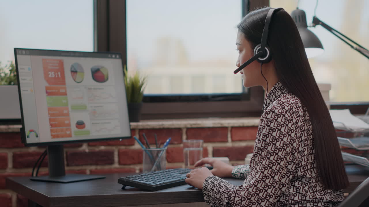 Woman consultant using headphones to chat on phone call
