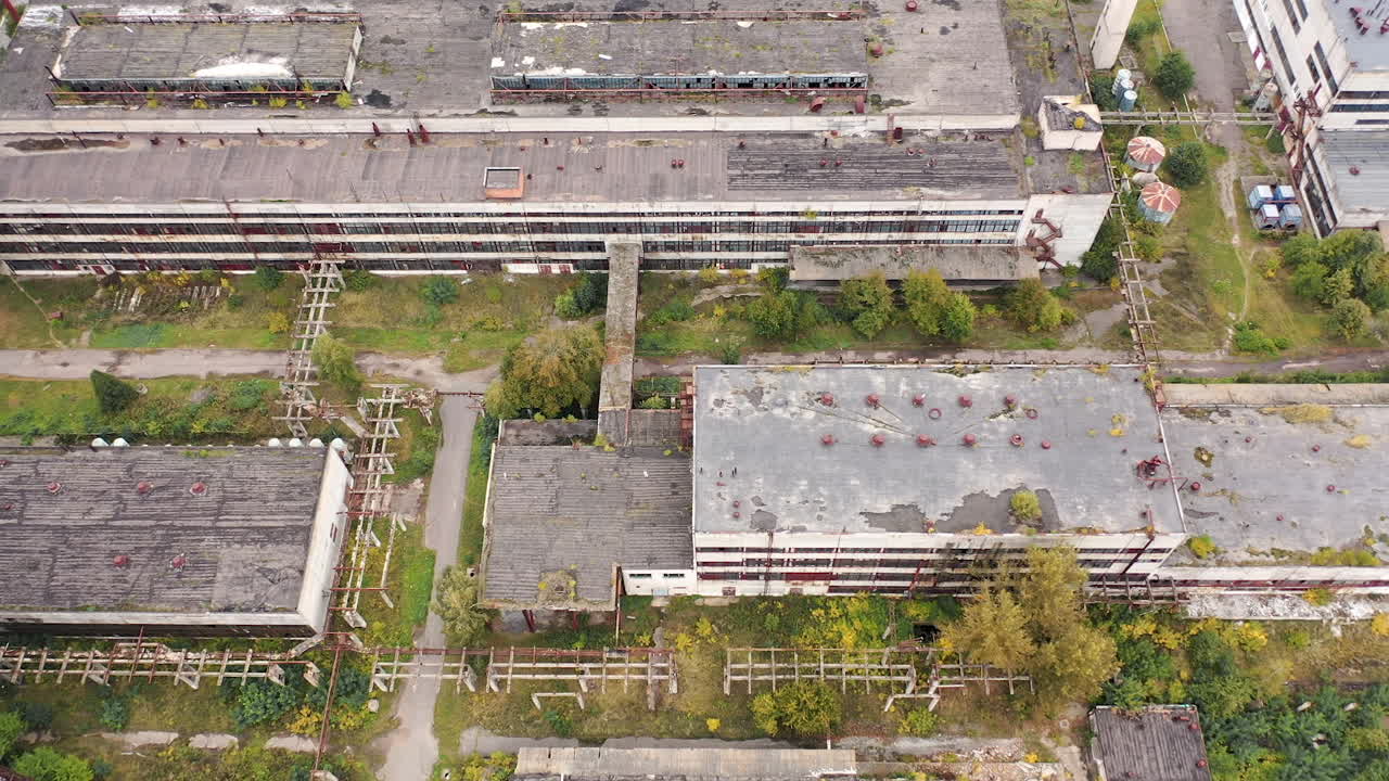Industrial big destroted factory. Aerial view of factory constructions.
