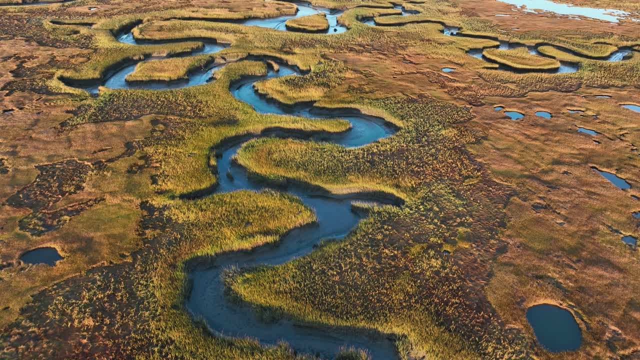 Aerial view of Salt Marshes and ocean vistas at sunrise Cape Cod, Barnstable Massachusetts in USA.