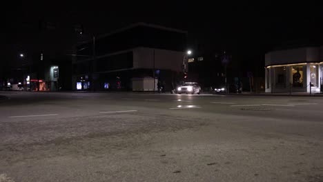 small city traffic junction at night time