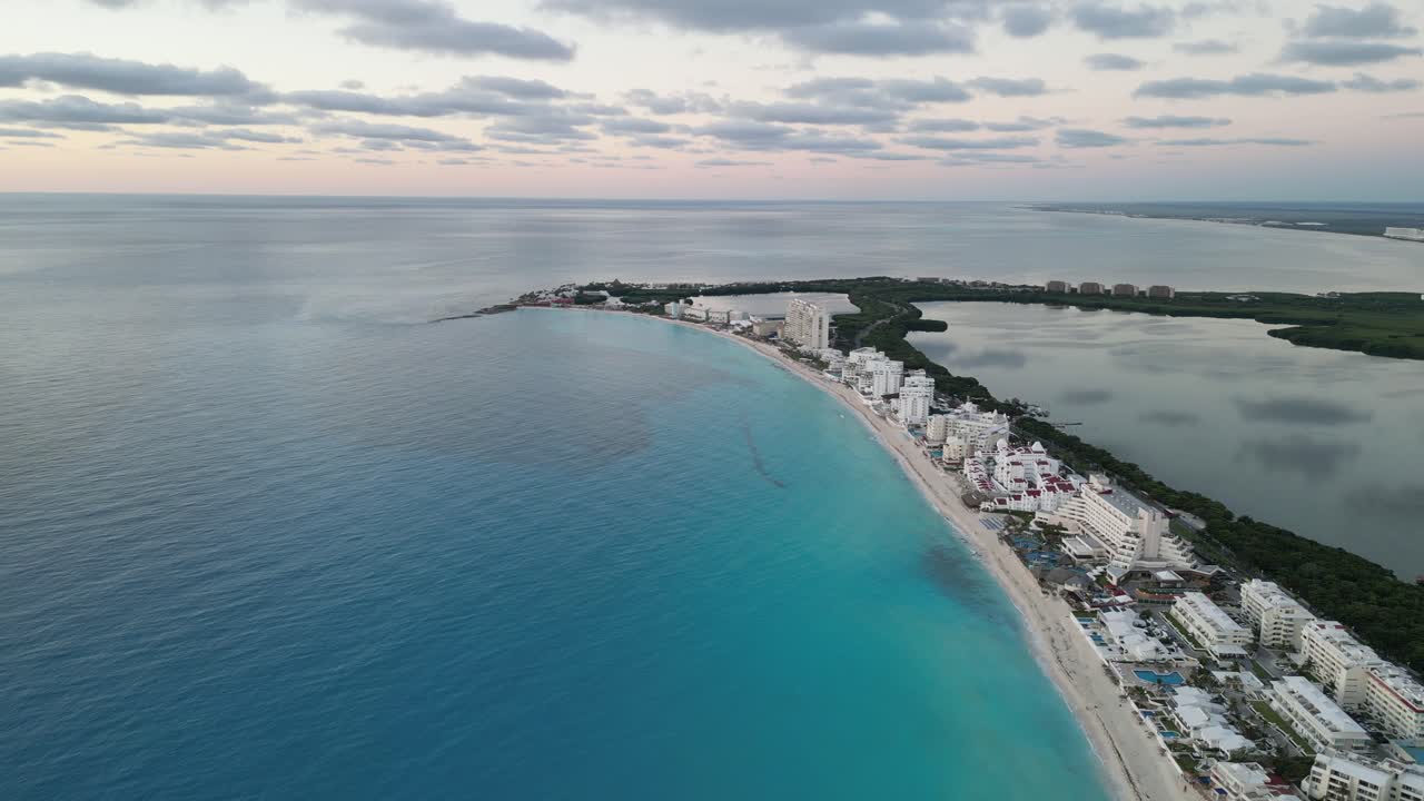 Cancun coastline with pristine beaches, clear waters, and hotels, aerial view, playa delfines