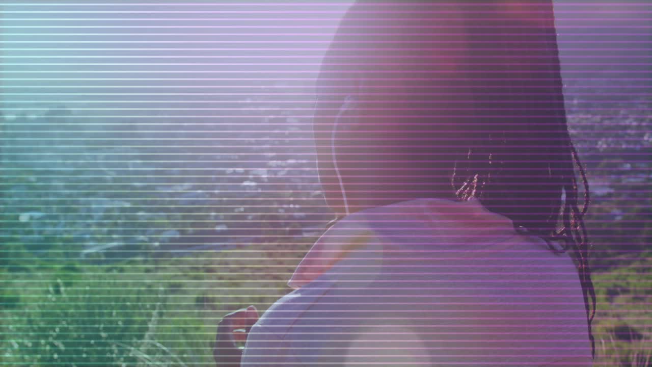 Woman adjusting earbud and tapping smartphone while testing audio, scanlines highlighting tech