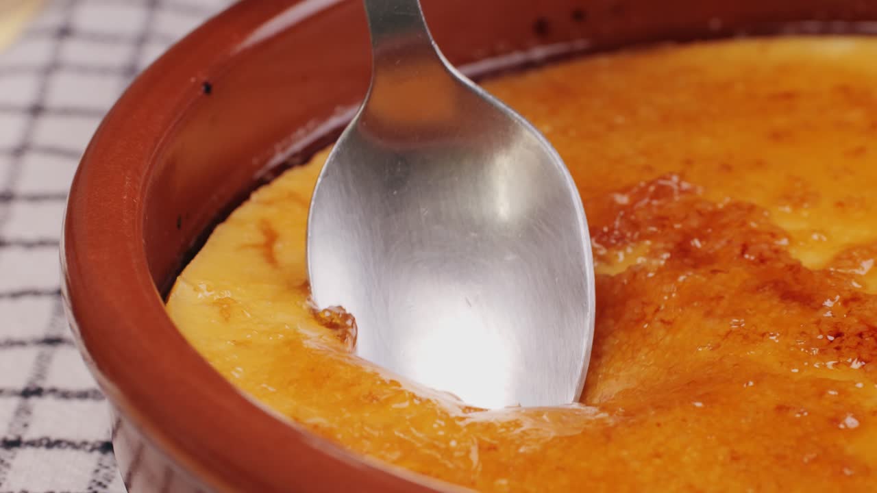 Spanish traditional food, catalonian dessert, crema catalana, catalan cream, spanish dessert close up, cooking.