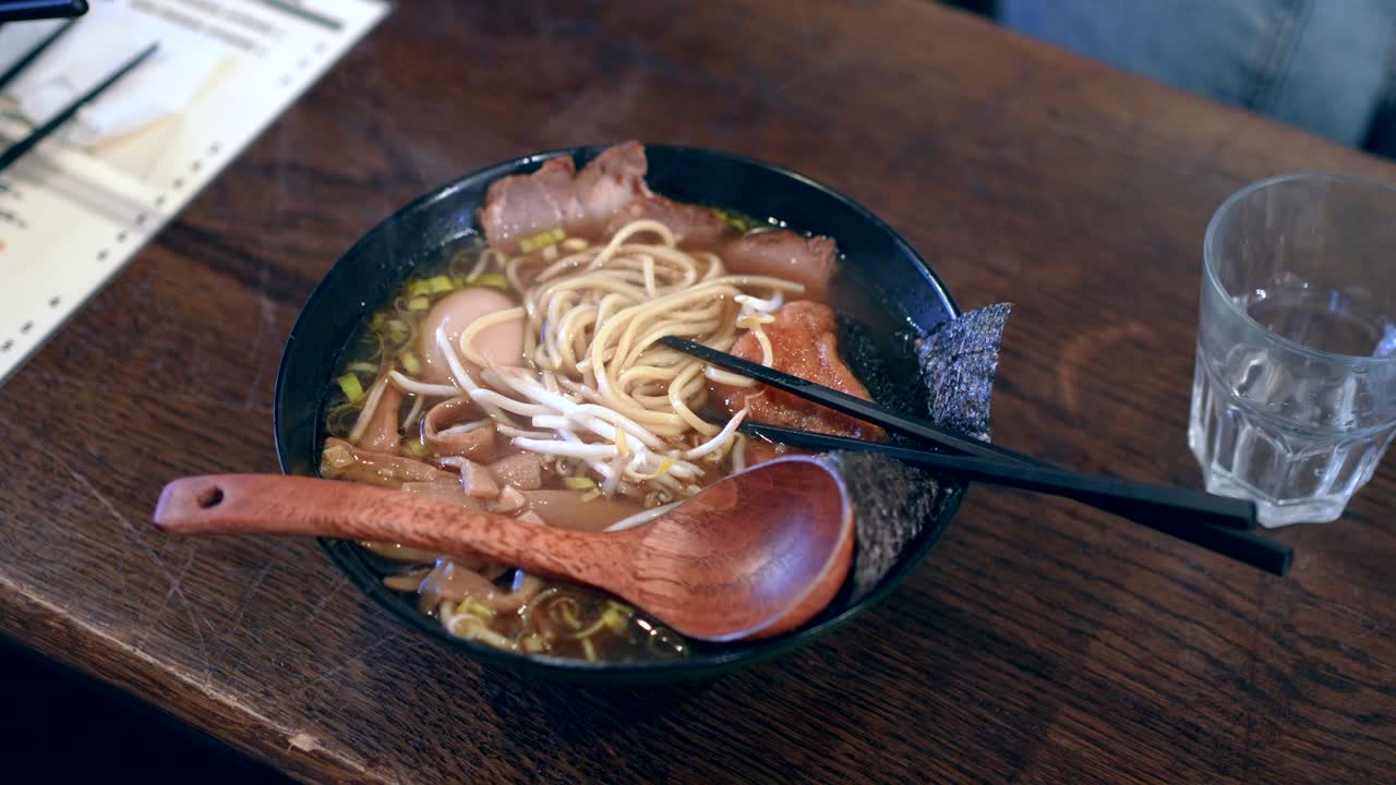 Eating Delicious Ramen with Chopsticks