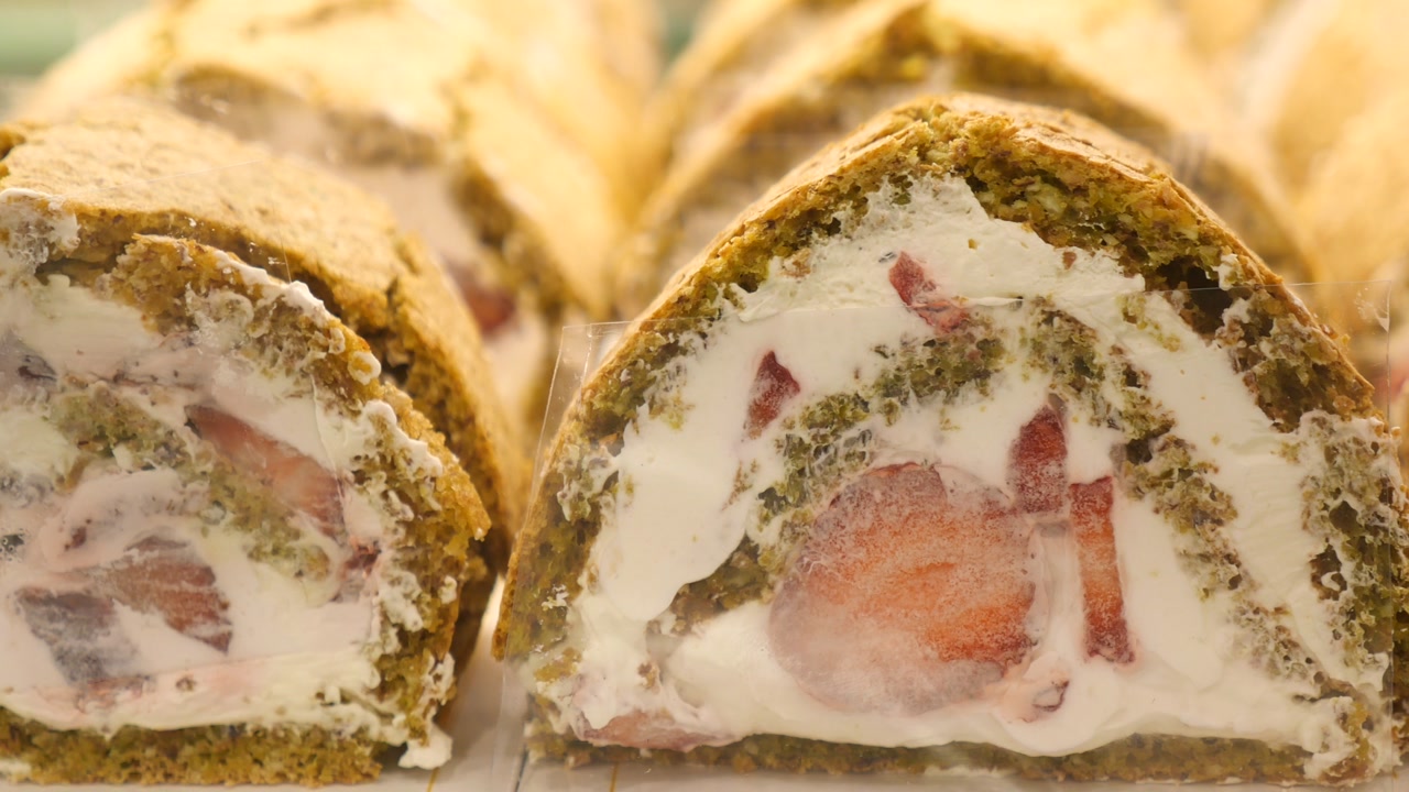 Delicious Roll Cake Slices with Strawberry and Cream Filling