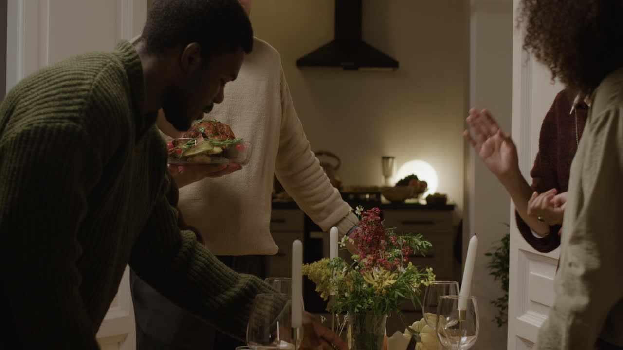 People gathered around a table for dinner
