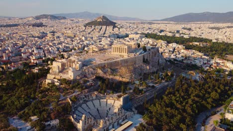 aerial panning drone shot above the ancient acropolis and the parthenon, unesco world heritage site, athens historic center, attica, greece