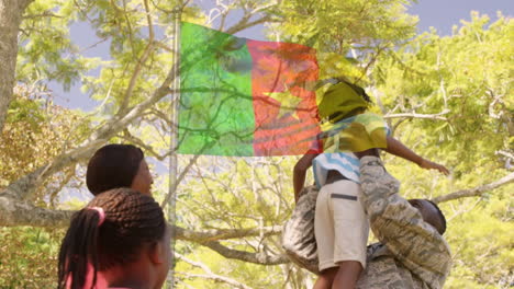 animación de la bandera de camerún sobre feliz soldado afroamericano padre y familia abrazándose