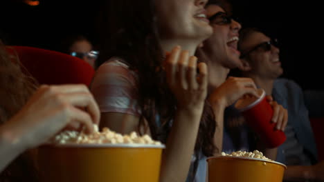 friends watching 3d movie in cinema