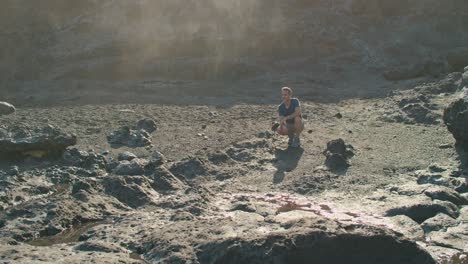 male hiker near marine geyser