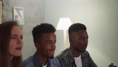 black guys with tense friends watch play of baseball team