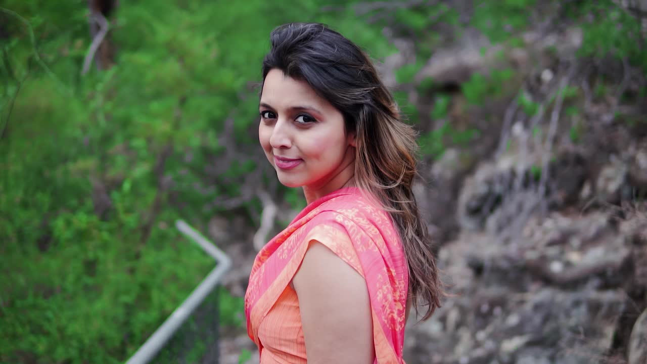 Woman In Saree Smiling In The Wilderness Of Blue Mountain In New South Wales, Australia. Slow Motion Shot