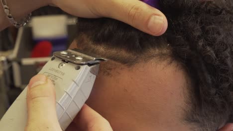 closeup of styling hair at barbershop