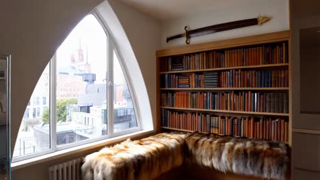 cozy library with city view