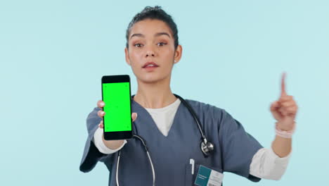 Woman,-doctor-and-pointing-to-phone-with-green