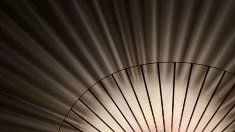 chandelier-rotation-that-create-a-spinning-wheel-of-shadows-and-lights