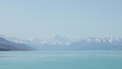 lake tekapo showing the snow peak in the disntance